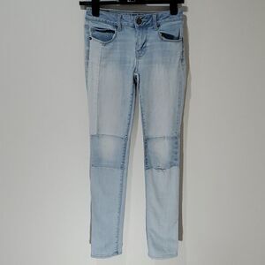 American Eagle light wash patched distressed skinny jeans